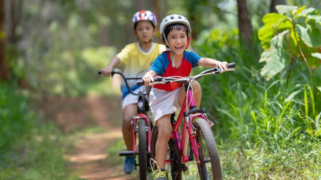 Kids riding a mountain bike