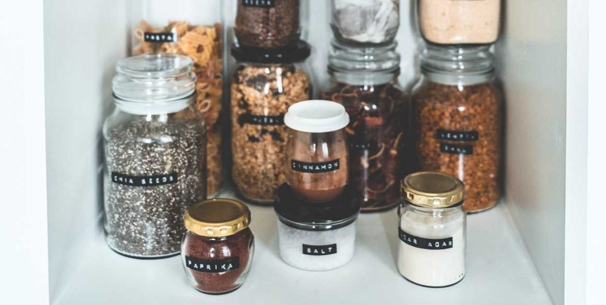 messy spice cabinet cluttered