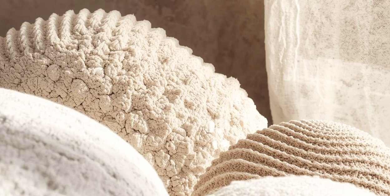 jute rug living room texture close up woven rug under sofa natural fiber