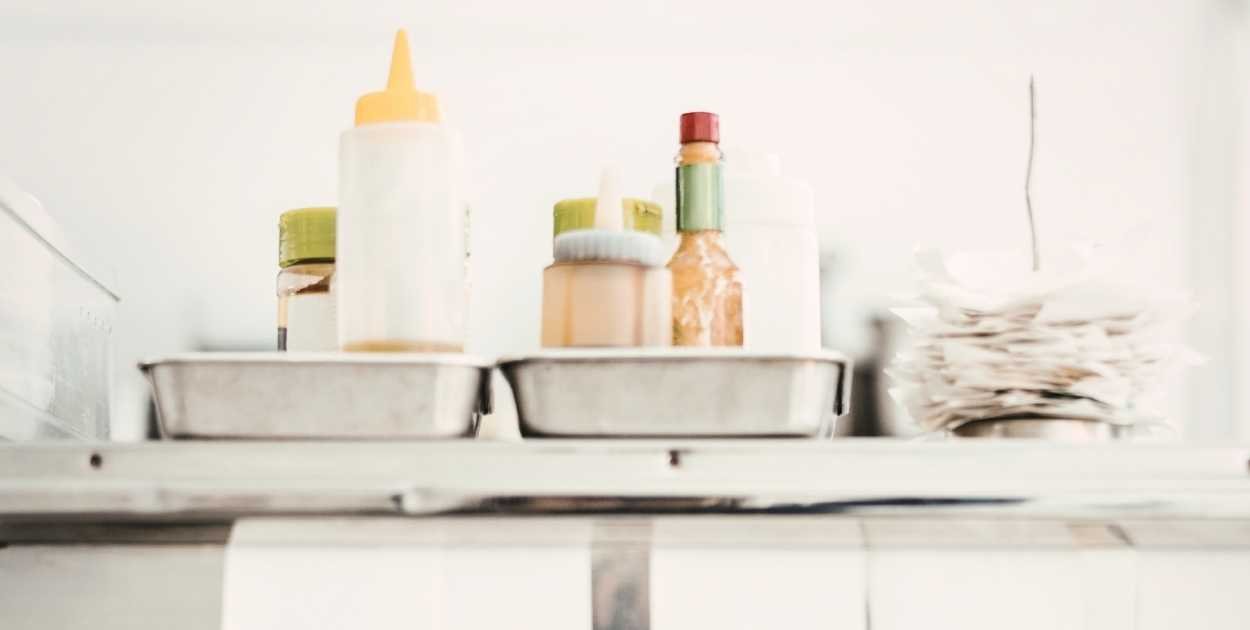 painting inside kitchen cabinet before open shelving makeover