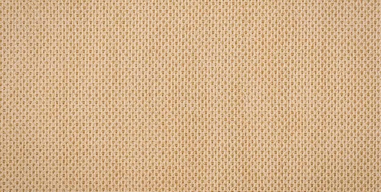 neutral living room layered textures linen jute knit wood rattan close up