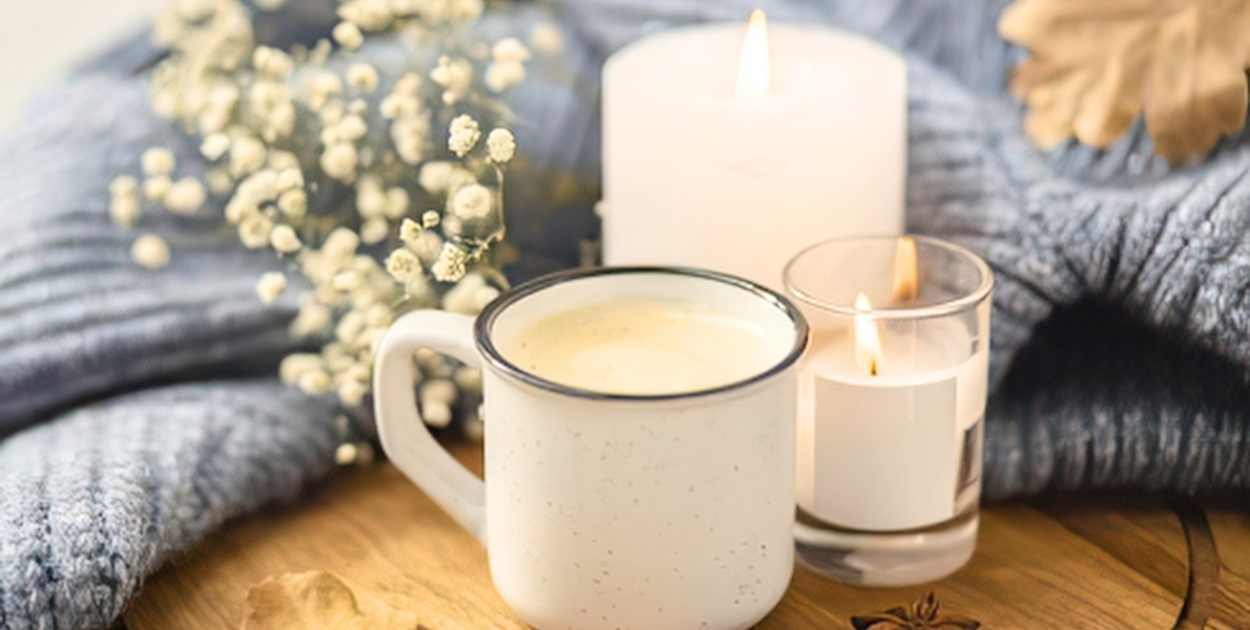 coffee table candle styling glass vessel cozy evening decor tray setup