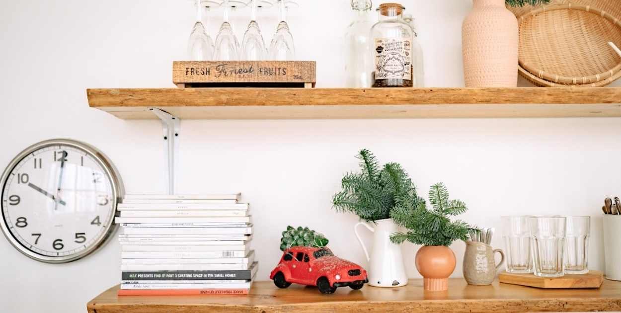 floating shelves styled minimal decor plant books candle