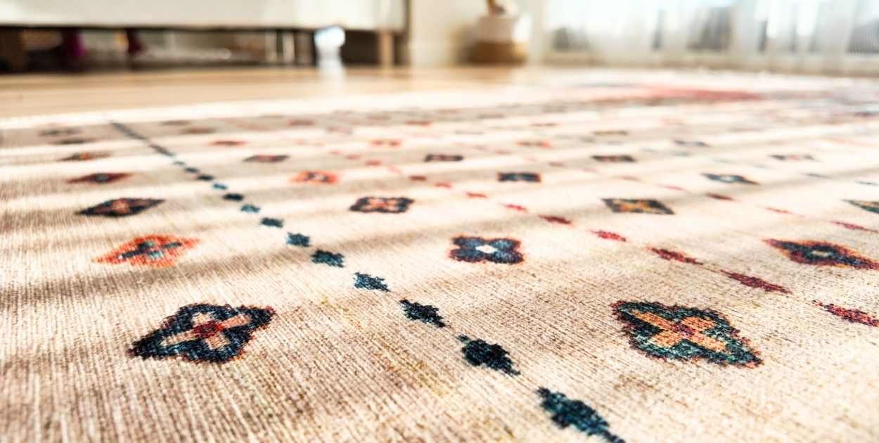 jute rug living room texture close up woven rug under sofa natural fiber